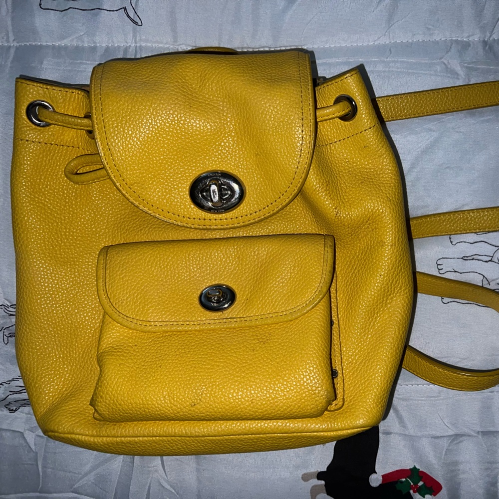 Yellow coach mini backpack